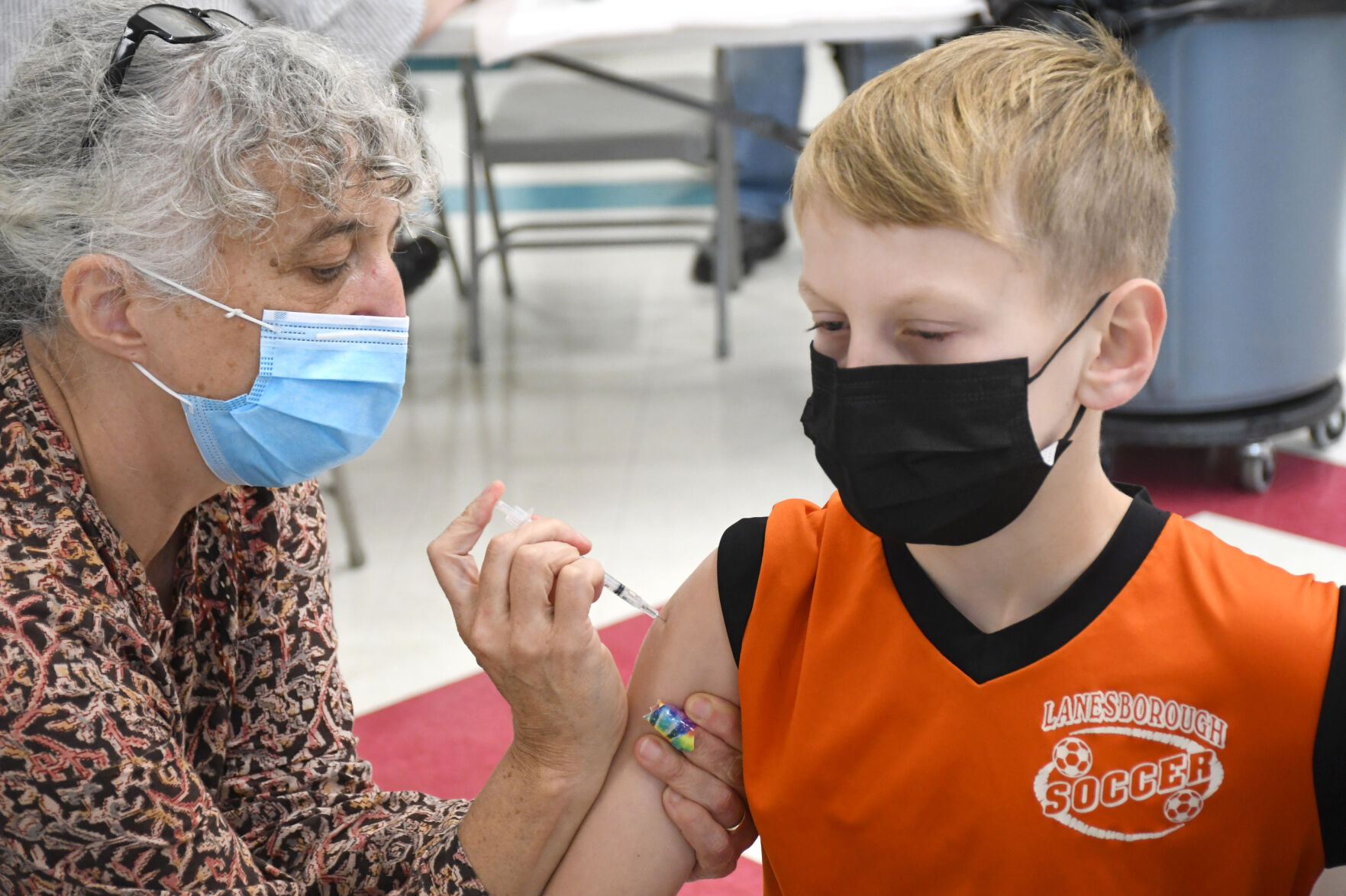 Daniel Hoffman gets a vaccination shot